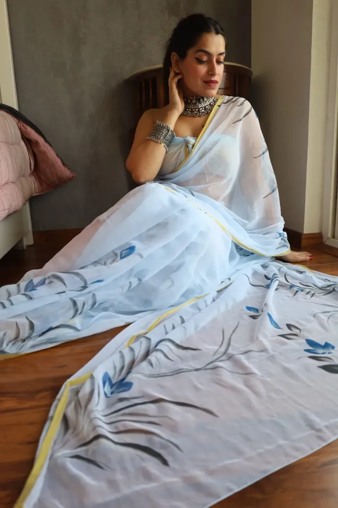 Hand brush painted  pastle blue color chiffon saree