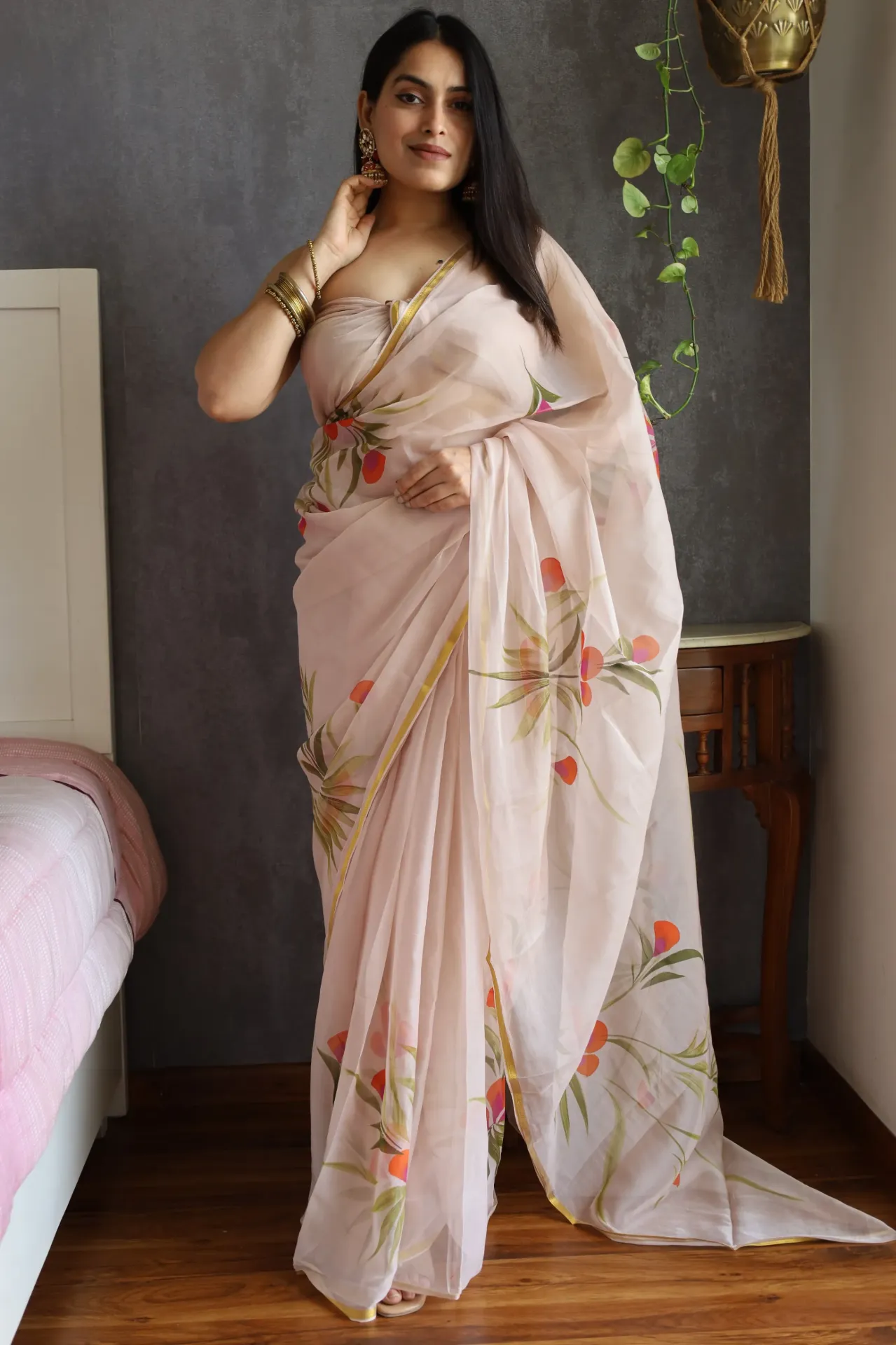 Hand brush painted  light cream colour chiffon saree