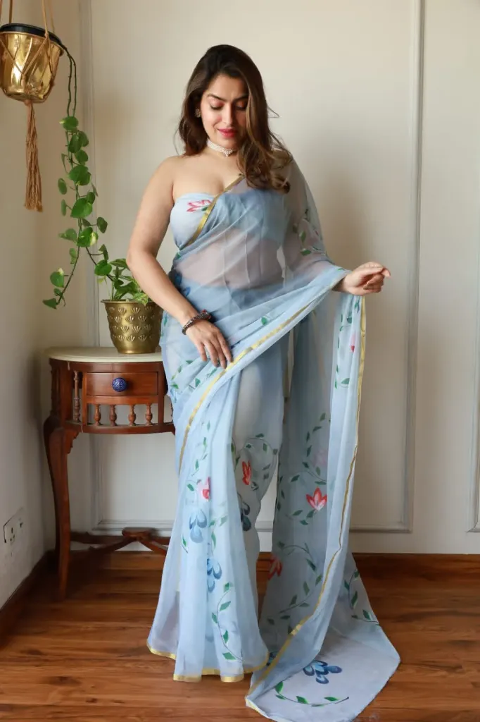 Hand brush painted  sky blue colour chiffon saree