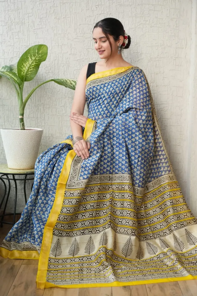 Hand block, kalamkari Ajrak Print  light blue with yellow border  maheswari Silk saree