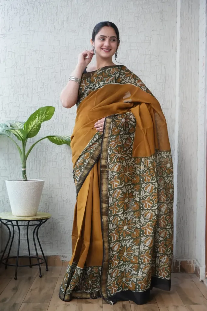 Hand block, kalamkari , hand batique Ajrak Print  golden yellow plain saree with floral pallu border maheswari Silk saree