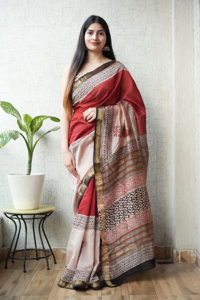 Hand block, kalamkari , hand batique Ajrak Print  red and beige colour saree with  pallu border maheswari Silk saree