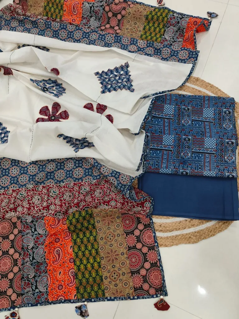 Hand block printed Cotton suit with beautiful patchwork duptta. (copy)
