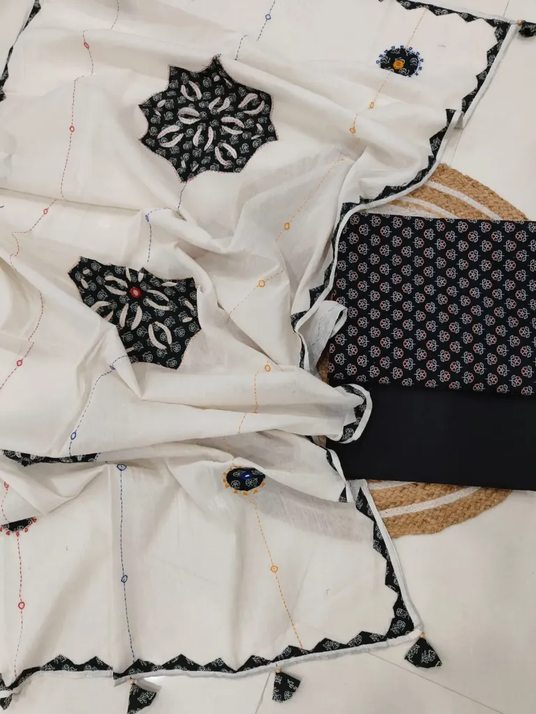 Hand block printed Cotton suit with beautiful patchwork duptta.