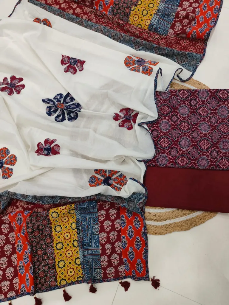 Hand block printed Cotton suit with beautiful patchwork duptta.
