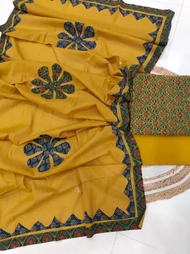 Hand block printed Cotton suit with beautiful patchwork duptta.
