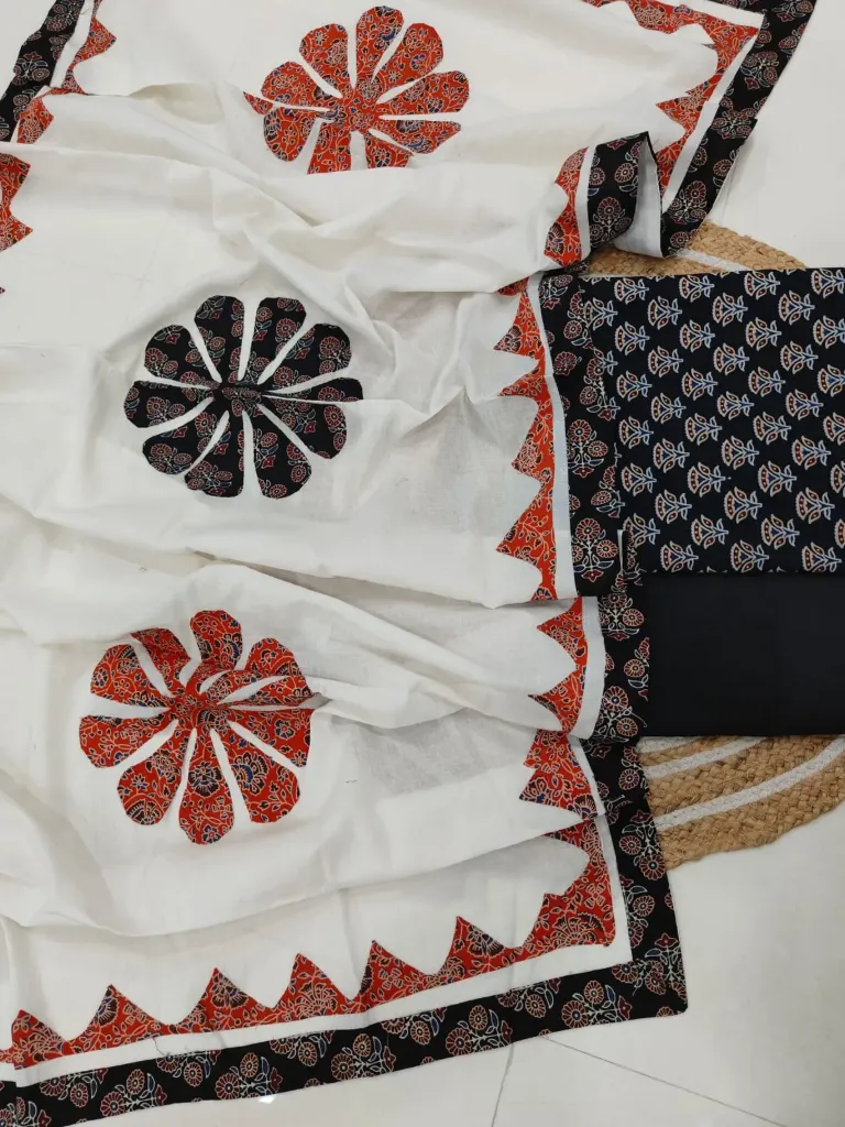 Hand block printed Cotton suit with beautiful patchwork duptta.