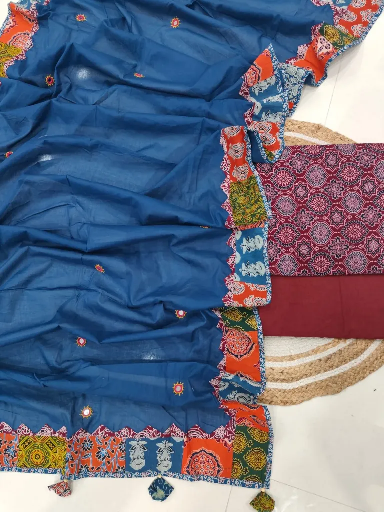 Hand block printed Cotton suit with beautiful patchwork duptta.