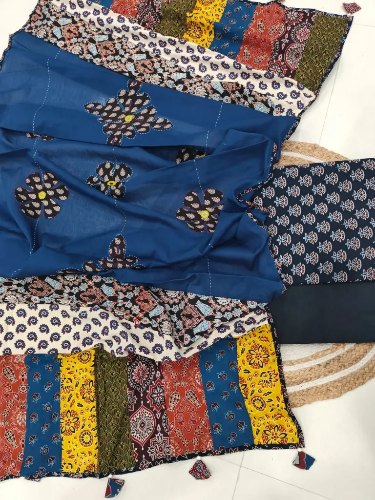 Hand block printed Cotton suit with beautiful patchwork duptta.