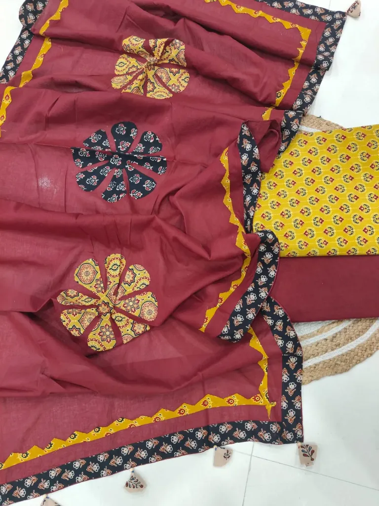 Hand block printed Cotton suit with beautiful patchwork duptta.