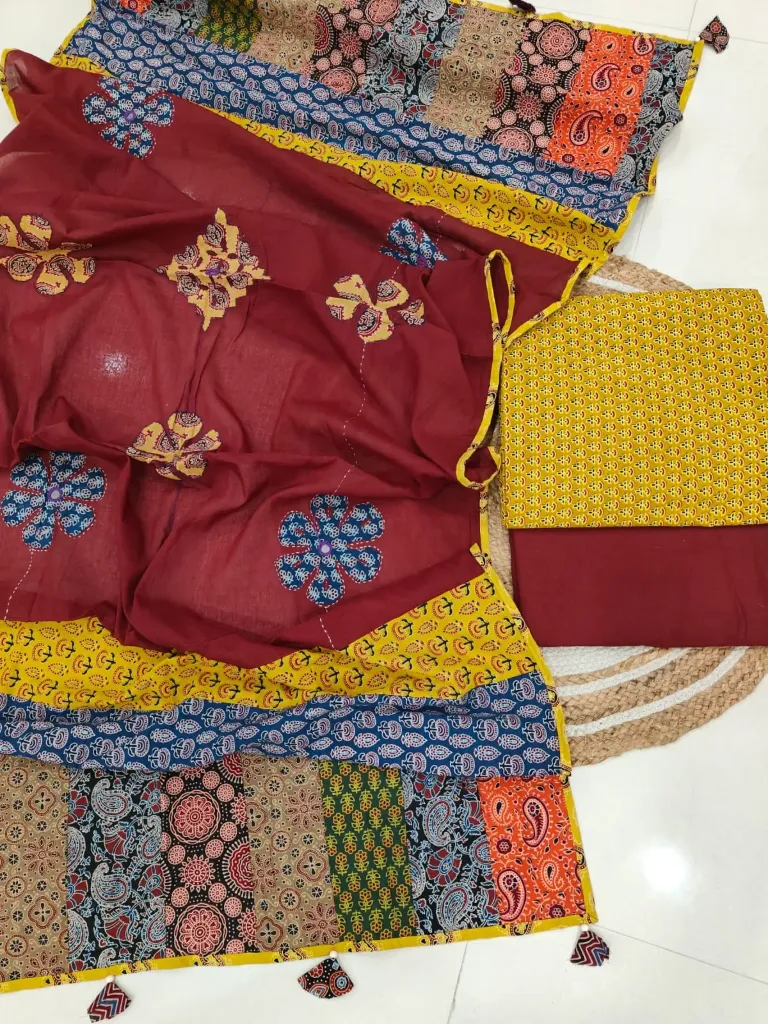 Hand block printed Cotton suit with beautiful patchwork duptta.