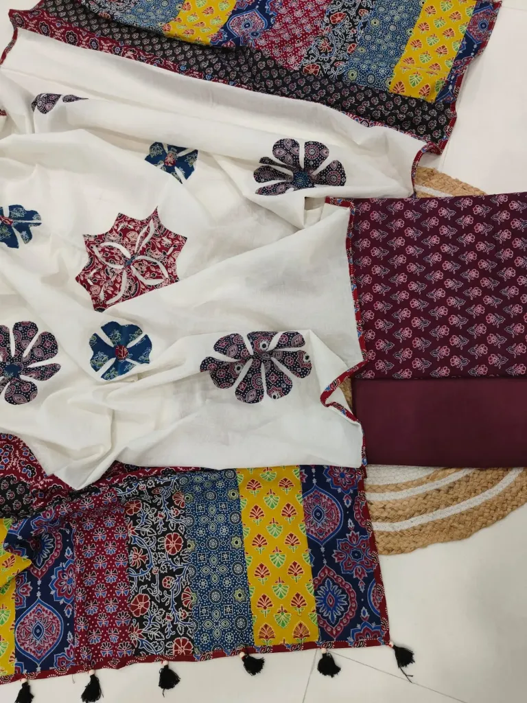 Hand block printed Cotton suit with beautiful patchwork duptta.