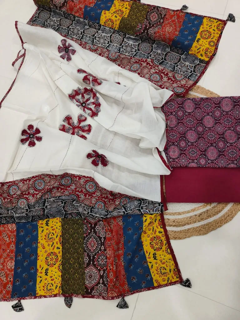 Hand block printed Cotton suit with beautiful patchwork duptta.