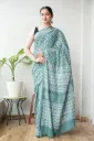 Hand block dabu printed greenish grey cotton mulmul saree